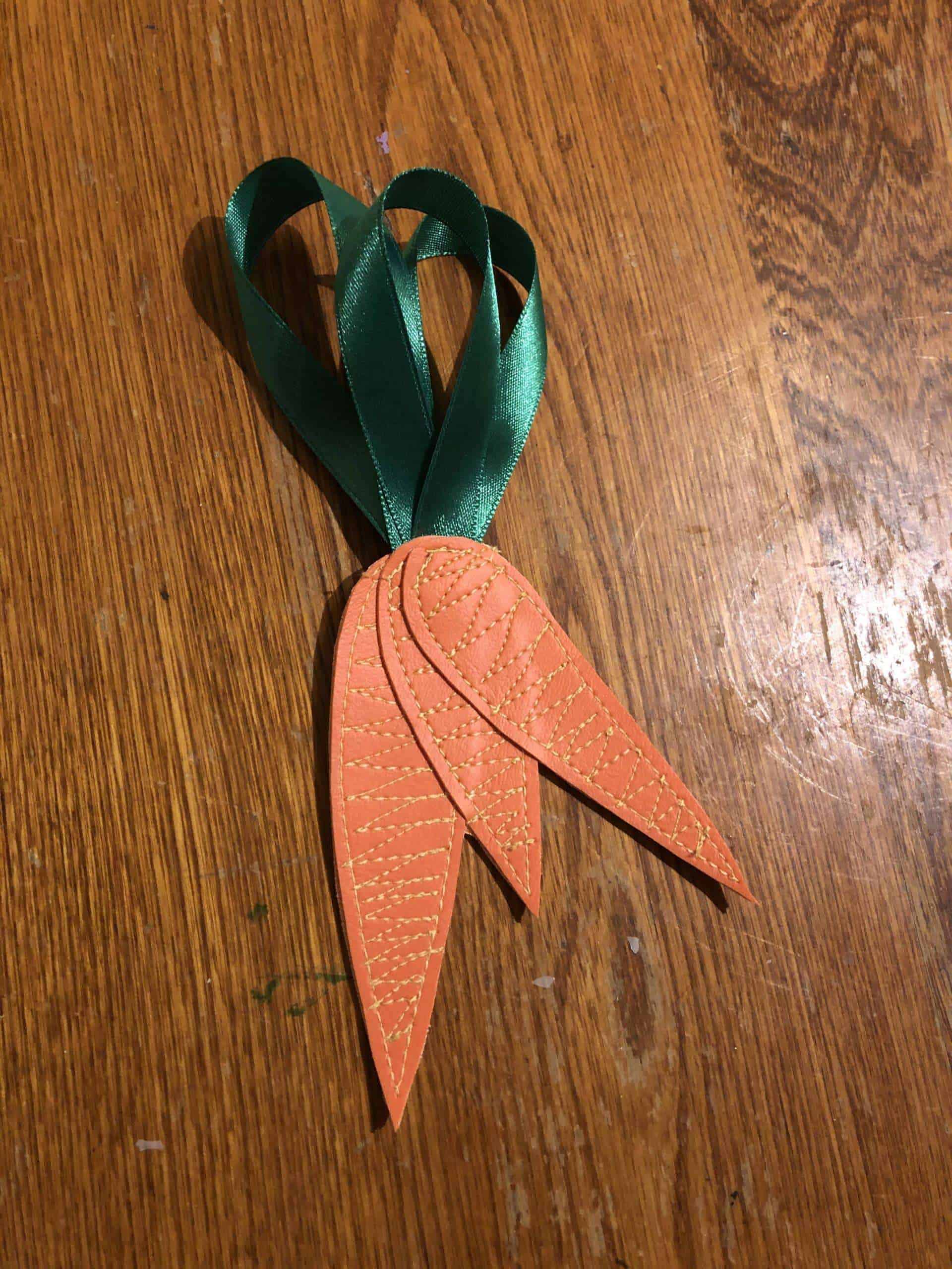 Upcycled ornament, freehand stitched exclusively from costume shop scraps. Classic Carrot Bunch Ornament
