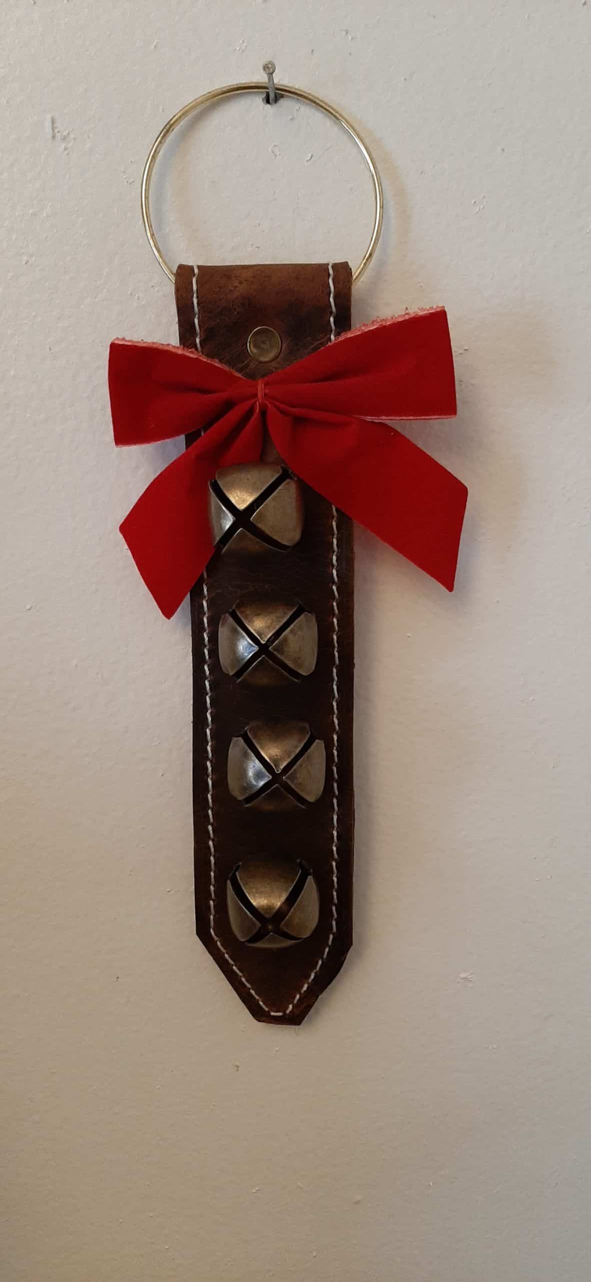 Door hanger with 4 large brass plated bells - brown leather