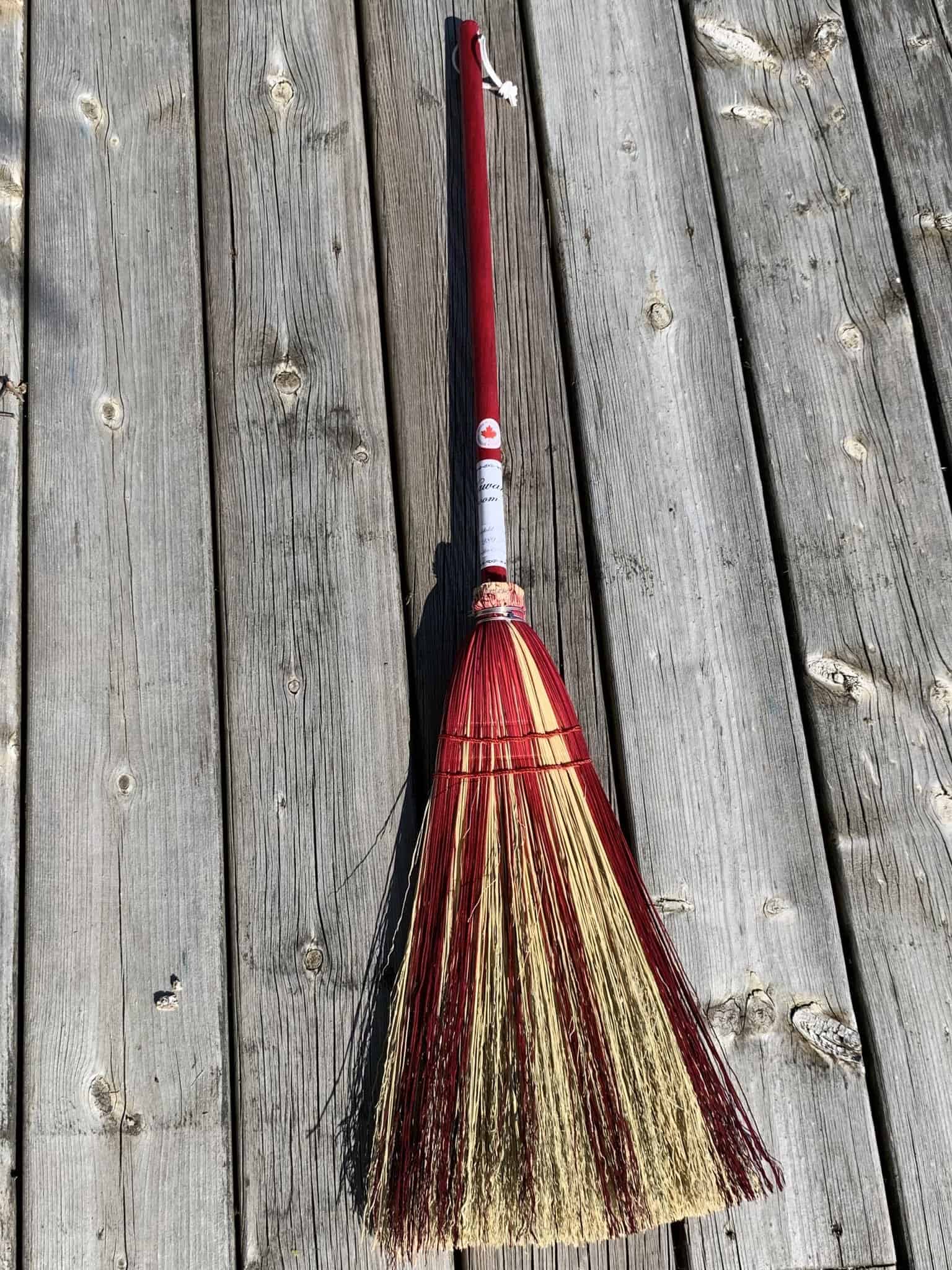 Fireplace broom with a splash of red