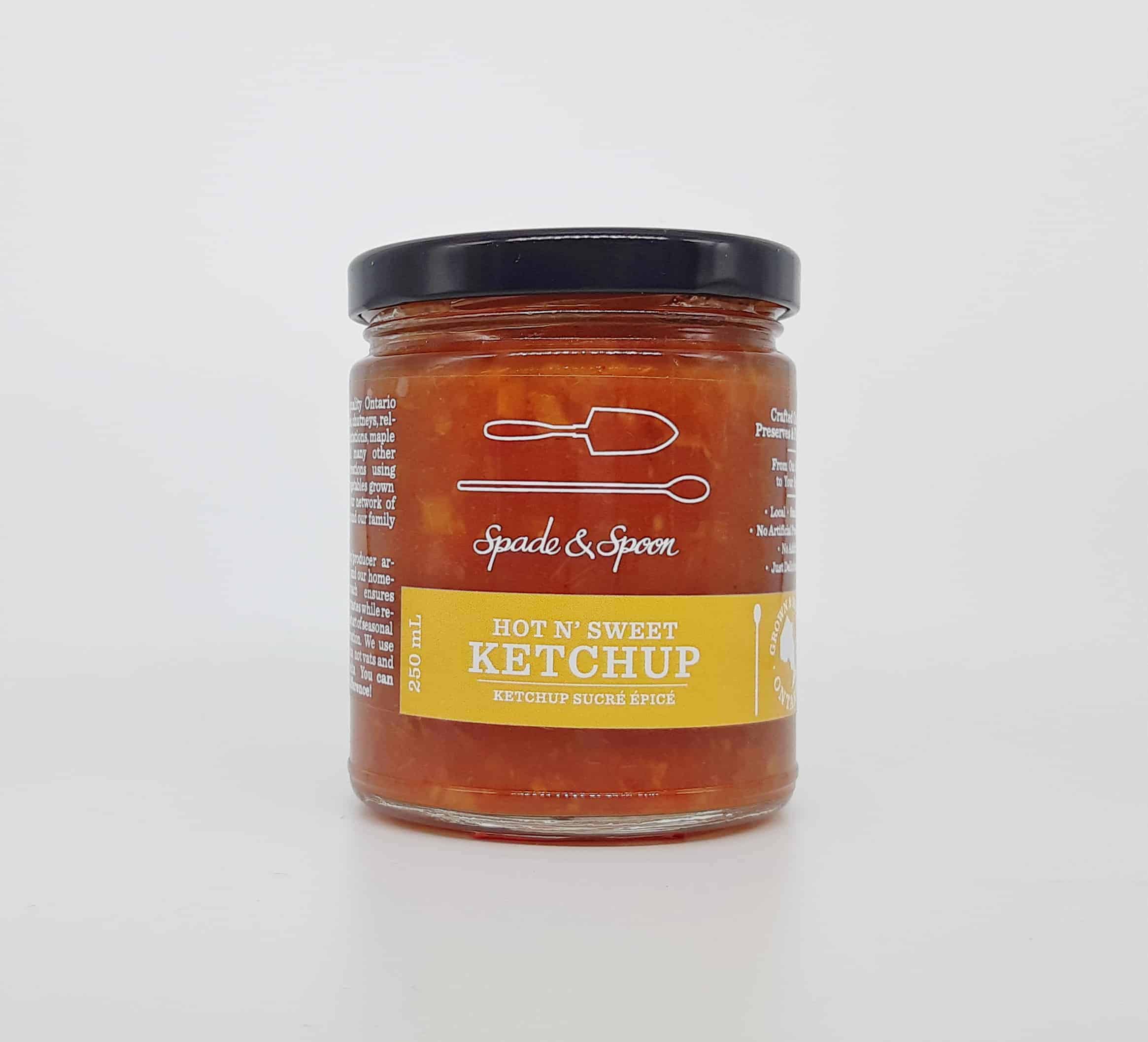 THIS AIN’T NO SQUEEZABLE KETCHUP. A TRUE TRADITIONAL CHUNKY KETCHUP SWEETENED PRIMARILY WITH APPLES, PEACHES, PEARS AND RAISINS, THIS GOES GREAT ON BURGERS, GRILLED CHEESE SANDWICHES, SCRAMBLED EGGS, AND QUICHE. INGREDIENTS: ONTARIO TOMATOES, ONTARIO ONIONS, ONTARIO APPLES, ONTARIO PEACHES, ONTARIO PEARS, ONTARIO RED PEPPERS, WHITE VINEGAR, ORGANIC CANE SUGAR, RAISINS, PICKLING SPICE, CAYENNE PEPPER, SEA SALT. HOT N’ SWEET KETCHUP