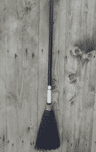 The elegant blue lobby broom is a small and light versatile broom made of premium black broomcorn, light 5/8 blue softwood handle and black twine. It is a great broom for touching up small spaces, entrance ways for residential or commercial spaces and sweeping larger vehicles. Lobby Broom - blue