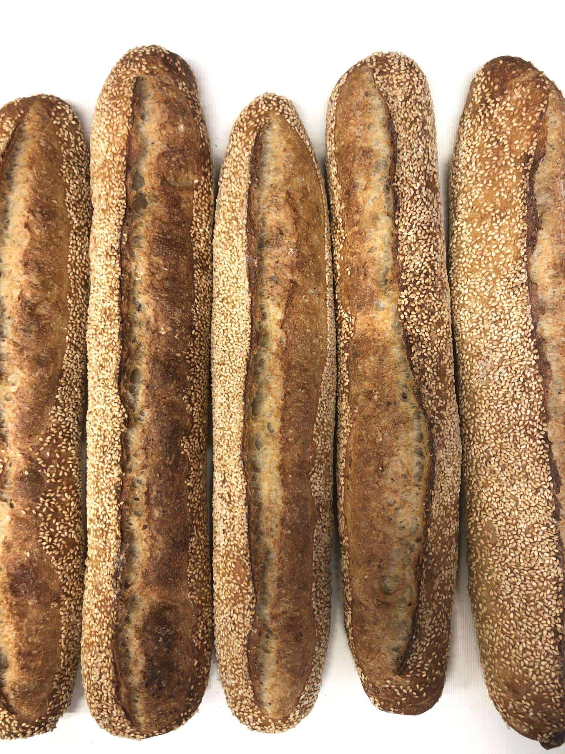 Baguette, made with organic white wheat, and yellow flint corn covered in sesame seeds Sesame Baguette