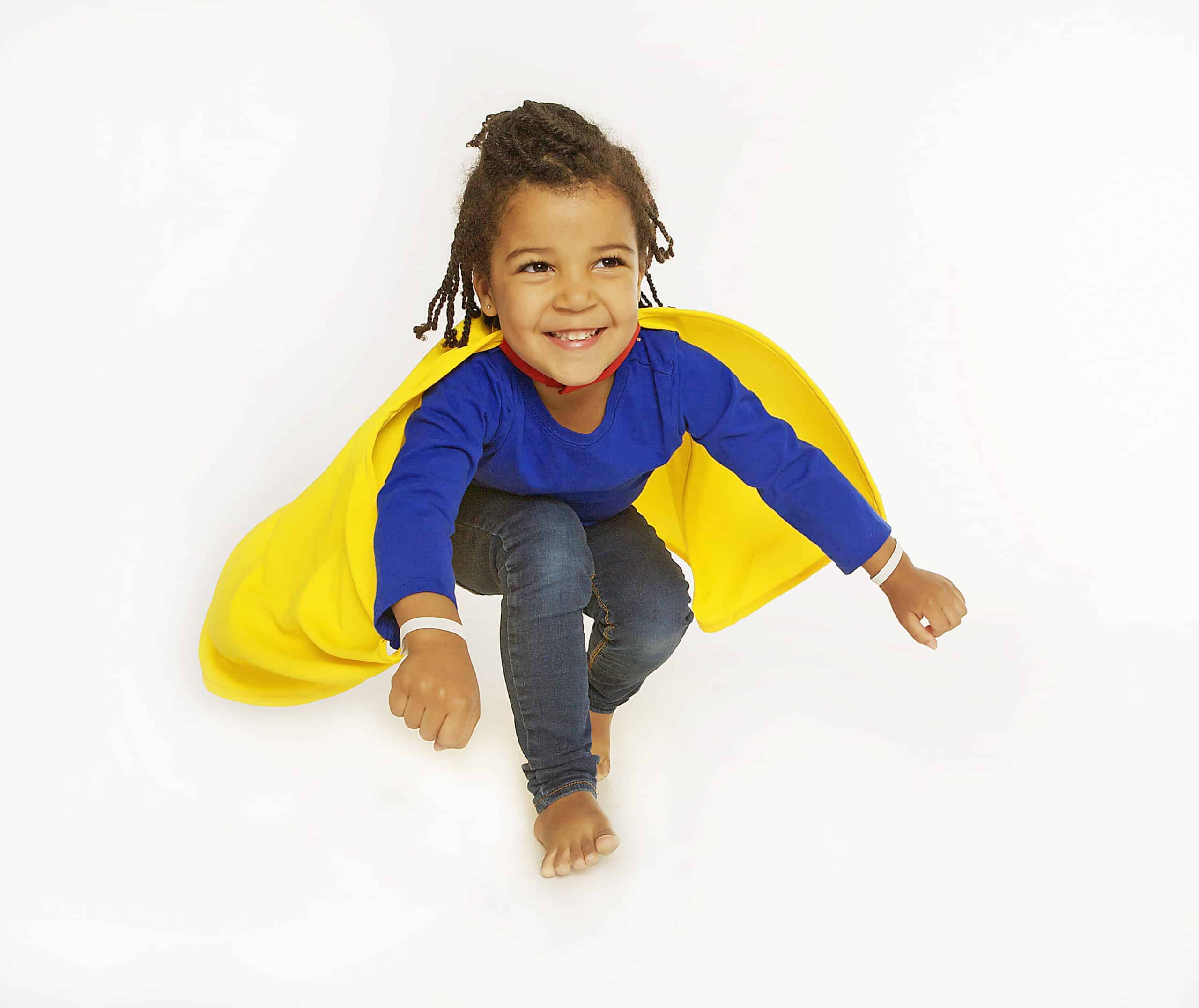 Classic Supercapes are made from light, breathable polyester, such as is used in sports jerseys. Scotchguarded for easy washing and can be dried in the dryer. Superloops at the wrists allow for improved 'flying fun' Size 2-3 fits up to small three year olds...but can certainly be worn as they get taller. Gold Classic Supercape Size 2-3