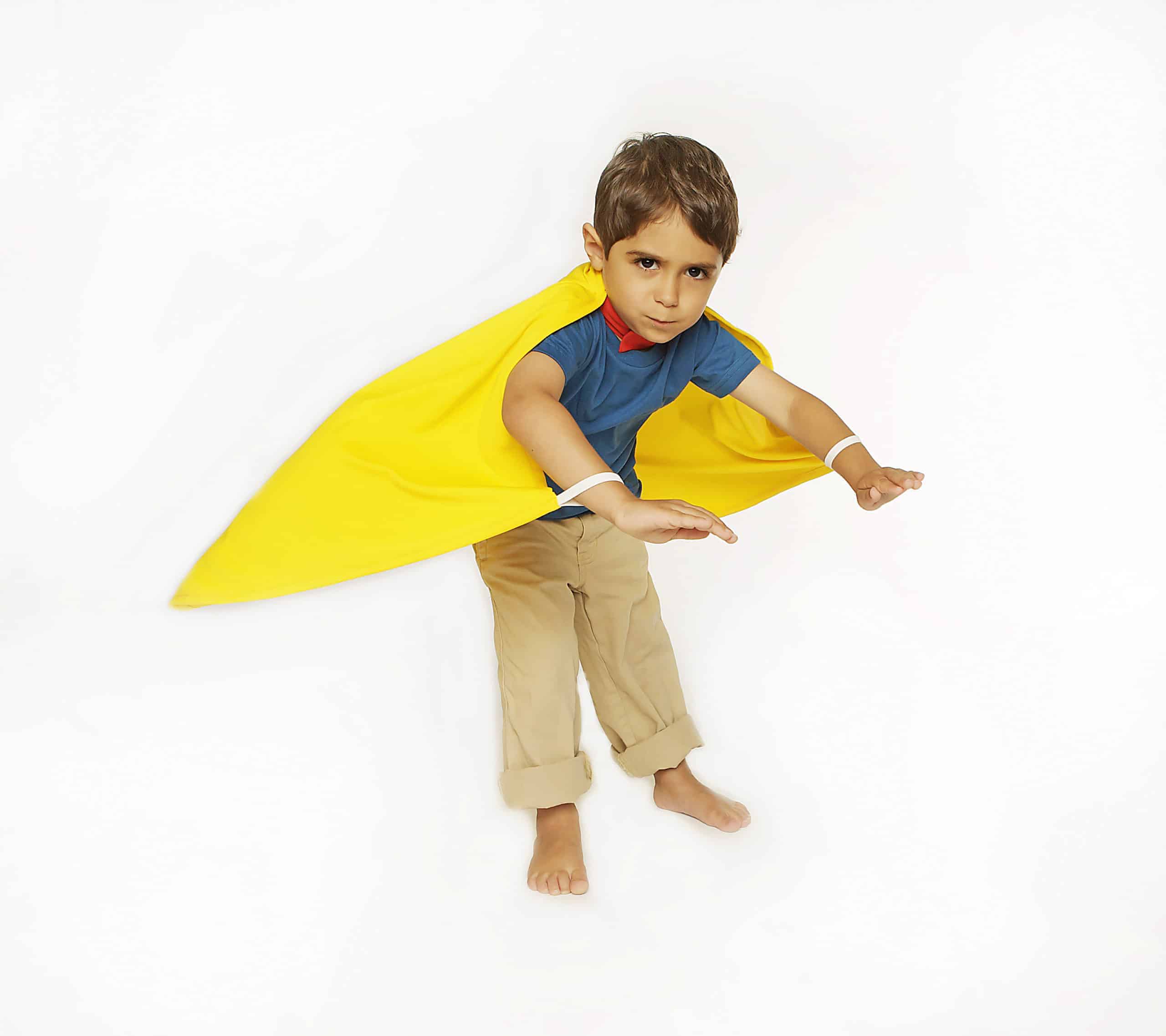 Classic Supercapes are made from light, breathable polyester, such as is used in sports jerseys. Scotchguarded for easy washing and can be dried in the dryer. Superloops at the wrists allow for improved 'flying fun' and breakaway velcro collar for safety. and breakaway velcro collar for safety. Size 4-6 fits a tall 3 year old up to about 6 years of age...though you never really outgrow a supercape - it just gets shorter as you get longer! Supercapes come in a reusable zipper pouch with a handle for storing your treasures. Gold Classic Supercape Size 4-6