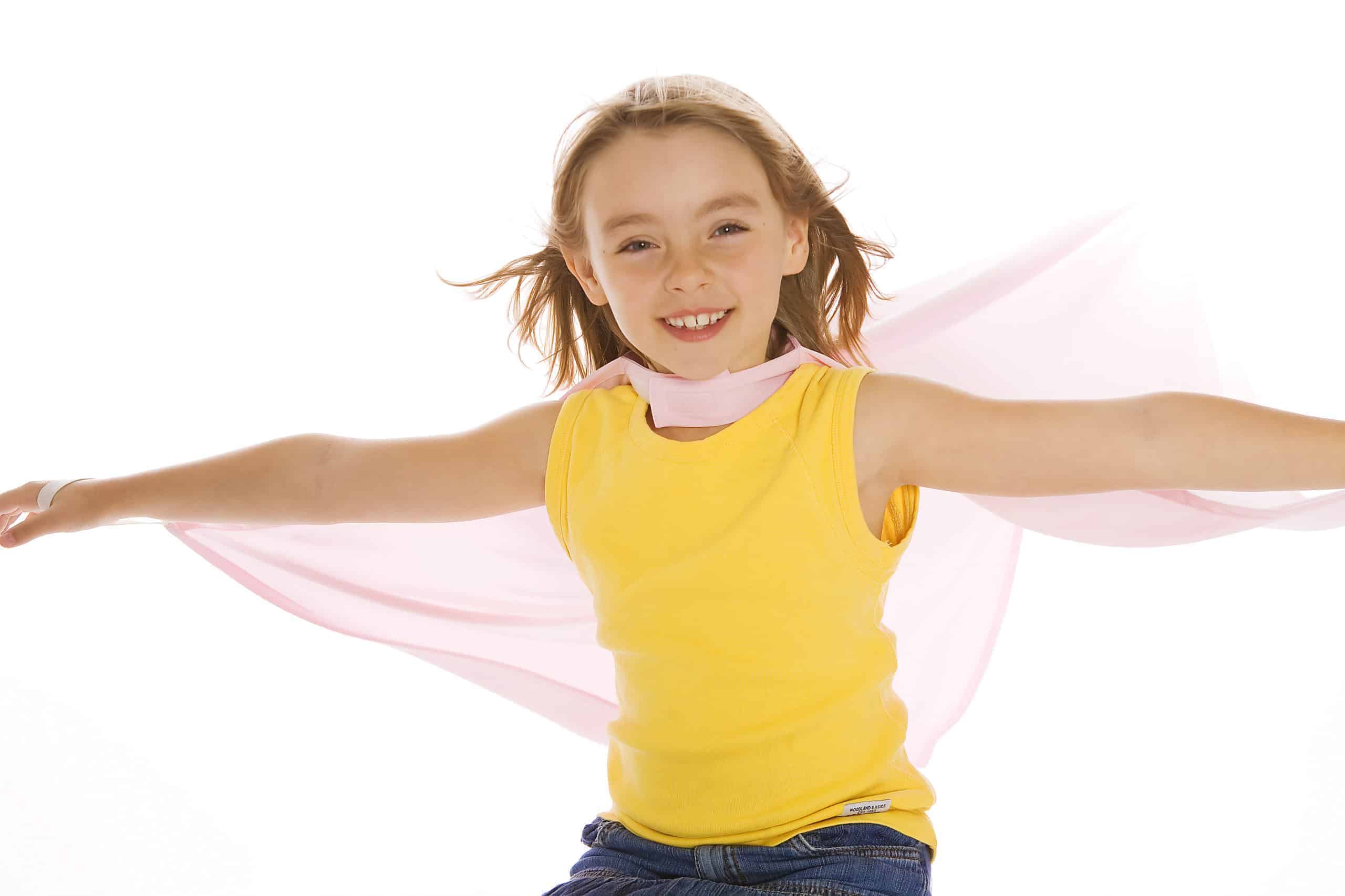 Classic Supercapes are made from light, breathable polyester, such as is used in sports jerseys. Scotchguarded for easy washing and can be dried in the dryer. Superloops at the wrists allow for improved 'flying fun' and breakaway velcro collar for safety.Size 4-6 fits a tall 3 year old up to about 6 years of age...though you never really outgrow a supercape - it just gets shorter as you get longer! Supercapes come in a reusable zipper pouch with a handle for storing your treasures. Pink Classic Supercape Size 4-6