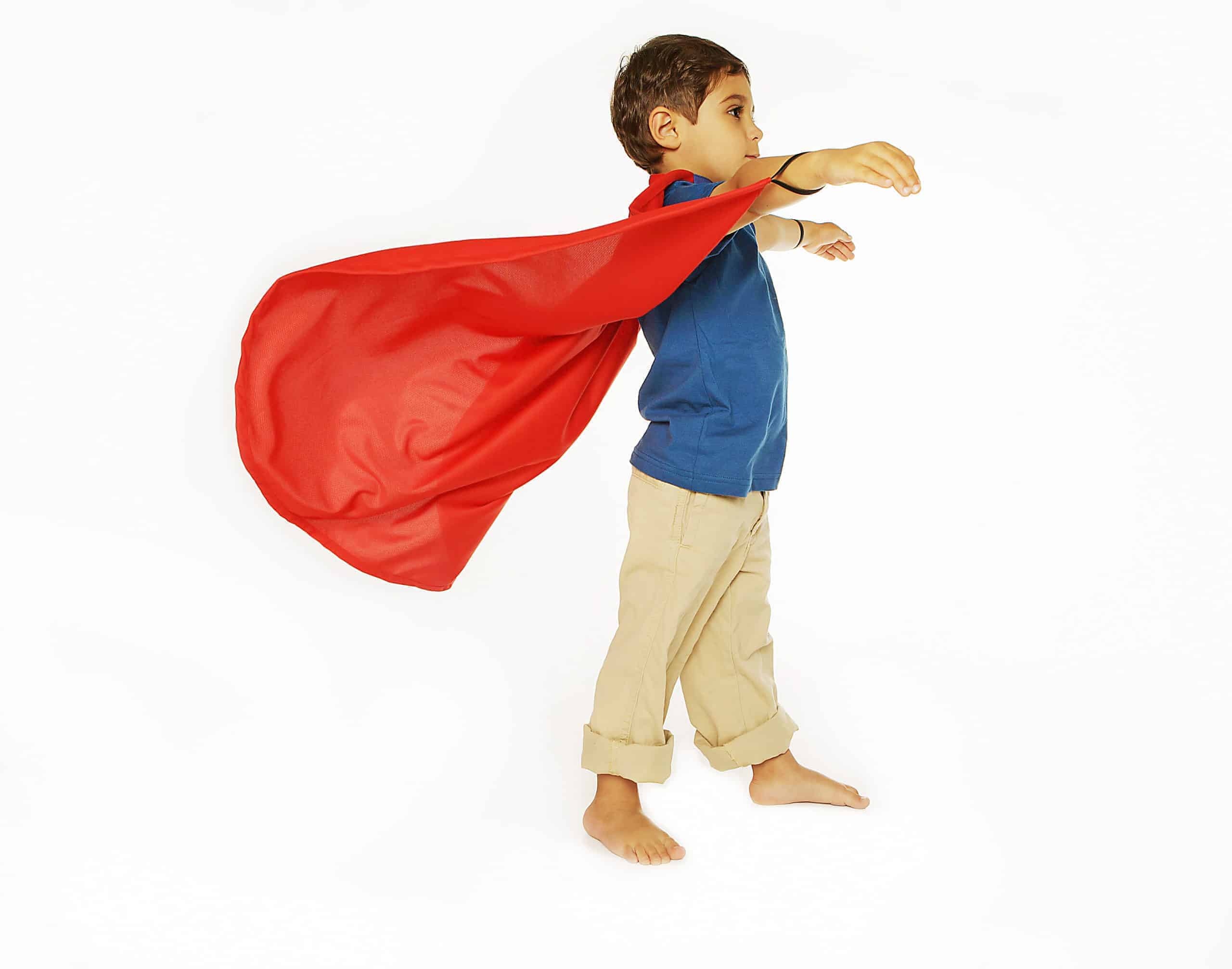 Classic Supercapes are made from light, breathable polyester, such as is used in sports jerseys. Scotchguarded for easy washing and can be dried in the dryer. Superloops at the wrists allow for improved 'flying fun' and breakaway velcro collar for safety. Size 2-3 fits up to small three year olds...but can certainly be worn as they get taller. Supercapes come in a reusable zipper pouch with a handle for storing your treasures. Red Classic Supercape Size 2-3