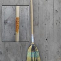 Old man hand carved broom