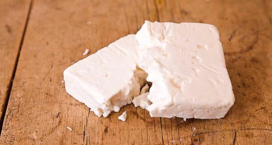 Raw milk feta that's been aged 60 days. Made with sheep milk from neighbouring, Wooldrift Farm, this feta is the real deal. Ideal for salads, omelettes, as pastry fillings, or addition to a delicious cracker. Feta is such a versatile cheese, it should always be in your fridge. 150g tub in brine. Made by River's Edge Goat Dairy for Wooldrift Farm, the original milk sheep flock in North America - yeah, really. Sheep Milk Feta