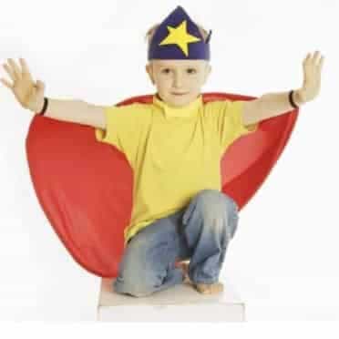 A child wearing a red supercape and a blue with yellow star adjustable fleece crown.