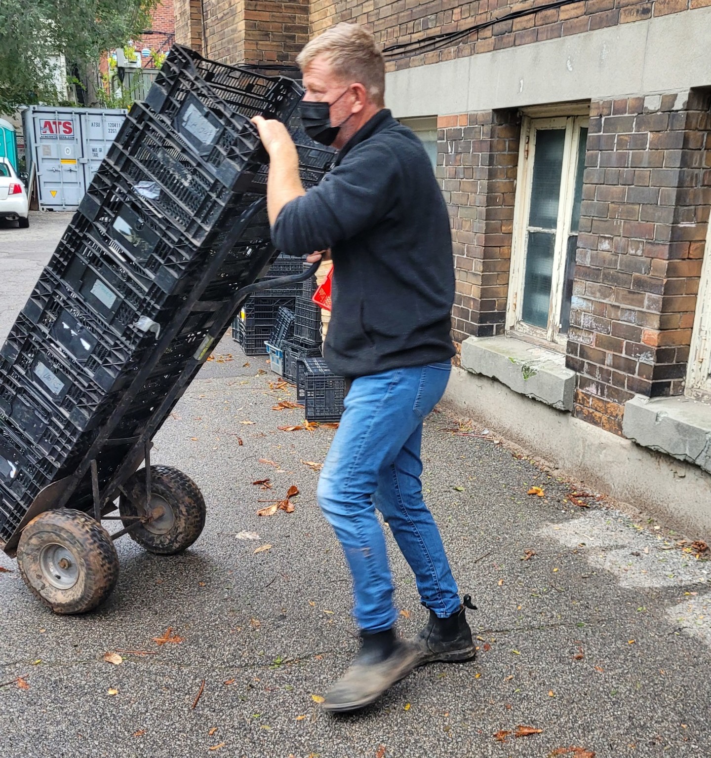 Jens with crates at depot