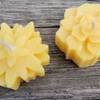 Flower beeswax candles pure 100% beeswax. Researches show that burning beeswax produces negative ions which neutralize odors and purifies the air.