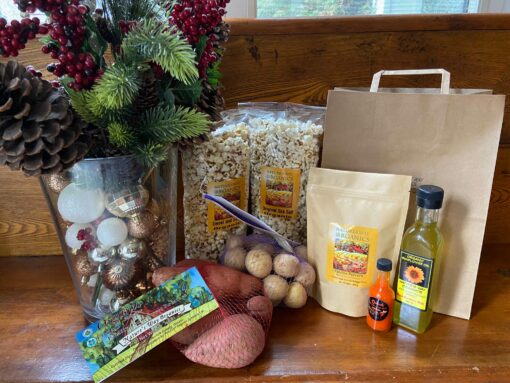 Natures way christmas basket 250ml organic sunflower oil, sea salt and sweet & salty popcorn bags, 480gr bag popcorn kernels, 50ml ❤️save $7❤️ ooohlala hot sauce, 2lbs each of mini yellow potatoes and sweet potatoes. All in one nice reusable paper bag for the gift of giving. All certified organic.