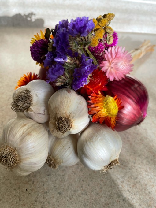 Flowery garlic scaled with a mini dried floral arrangement