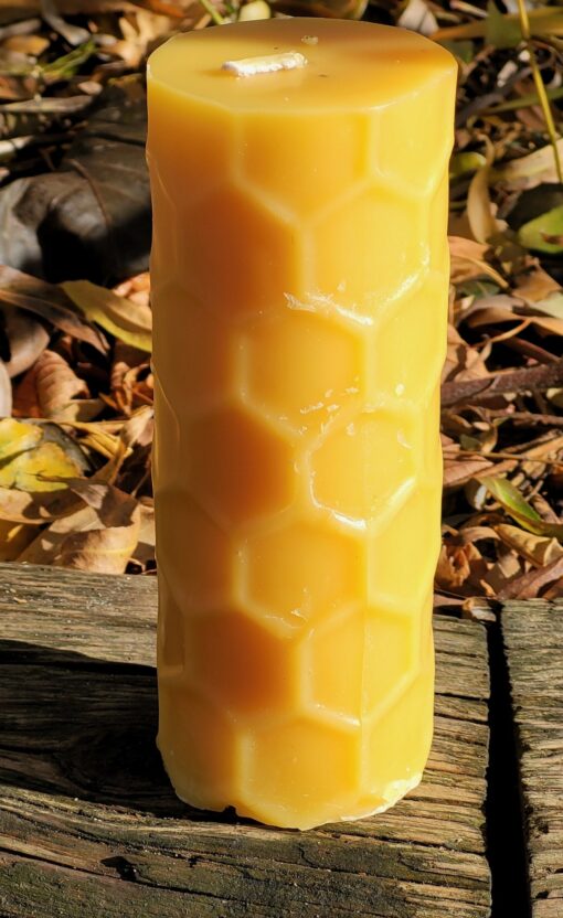 Honeycomb pillar candle pure 100% beeswax. Researches show that burning beeswax produces negative ions which neutralize odors and purifies the air.