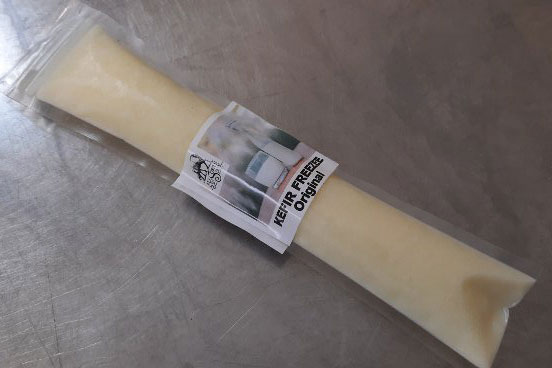 Take it anywhere with you! Rich, creamy, and that frozen tingly on your tongue. Ideal for lunches, hikes, or anywhere a jar just won't work. One 85g serving of Kefir in a reusable "Zipsicle" freezee style pop-up packaging. Made of extra durable Phthalate-free, BPA-free, BPS-free, Pvc-free plastic with a resealable locking top. Each one has bee sealed so they won't spill, but once opened they can be washed and refilled with water, juice, or more kefir of course! Kefir Freezee Original Take it anywhere with you! Rich, creamy, and that frozen tingly on your tongue. Ideal for lunches, hikes, or anywhere a jar just won't work. One 85g serving of Kefir in a reusable "Zipsicle" freezee style pop-up packaging. Made of extra durable Phthalate-free, BPA-free, BPS-free, Pvc-free plastic with a resealable locking top. Each one has bee sealed so they won't spill, but once opened they can be washed and refilled with water, juice, or more kefir of course!