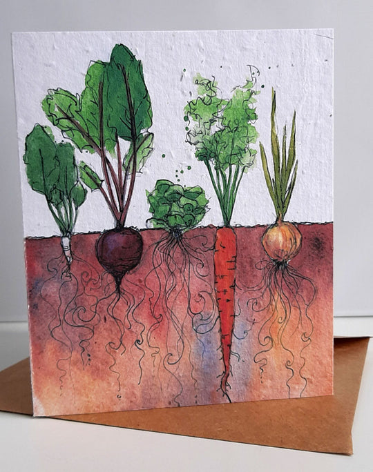 Unique greeting card of Jennifer's farm inspired artwork on plantable wildflower seed paper. An ideal way to send your feeling and give the gift of plants as well.Each card is 4"x5" and comes with it's own recycled, unbleached kraft paper envelope. Plantable paper is a biodegradable eco-paper made with post-consumer and post-industrial paper waste that is embedded with seeds. (No trees harmed for this paper!) When the paper is planted in a pot of soil, the seeds grow and the paper composts away. Veggie Garden - seed paper greeting card