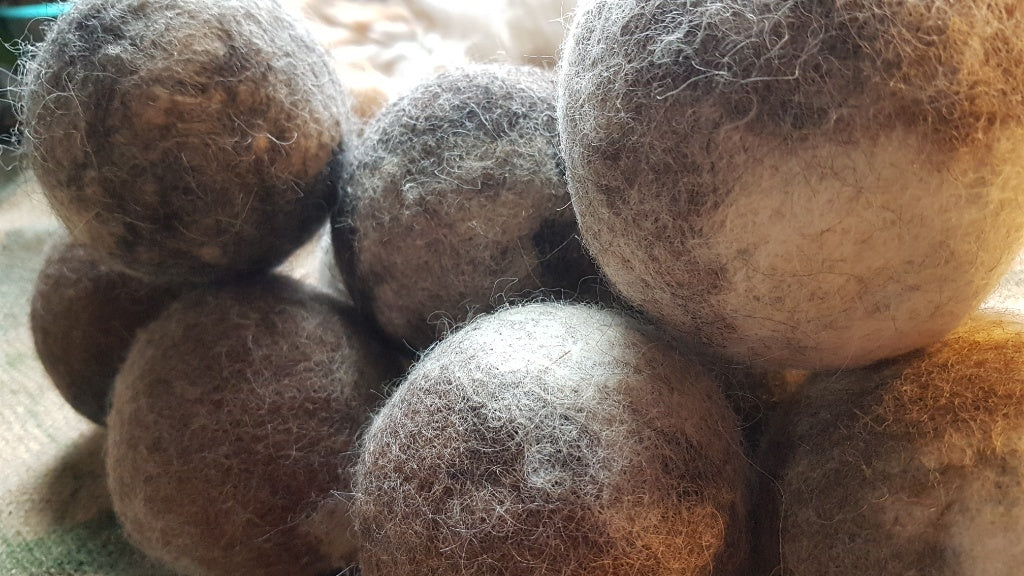 Handmade here on farm from our own wool. 2 per package. Colours will vary as we have any colored sheep! Dryer Balls